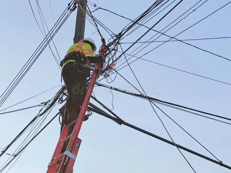 electrician-working-telephone-lines-new-york-city-117724623