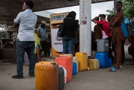 people-queue-containers-fuel-station-ikeja-district-440nw-12834379e